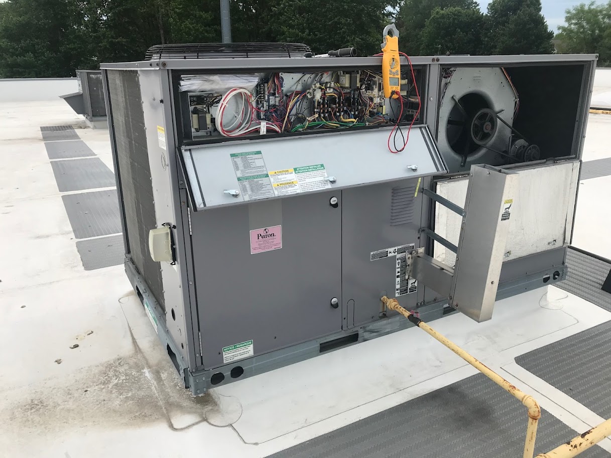 ROOF TOP HEATING + COOLING UNIT